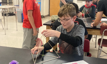 student builds model