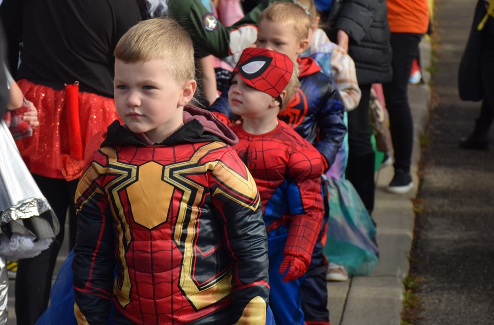 spiderman guy walking in the parade