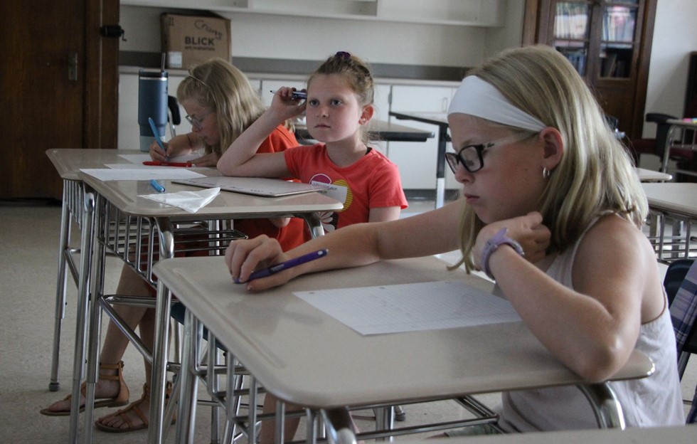 Three students in classroom 