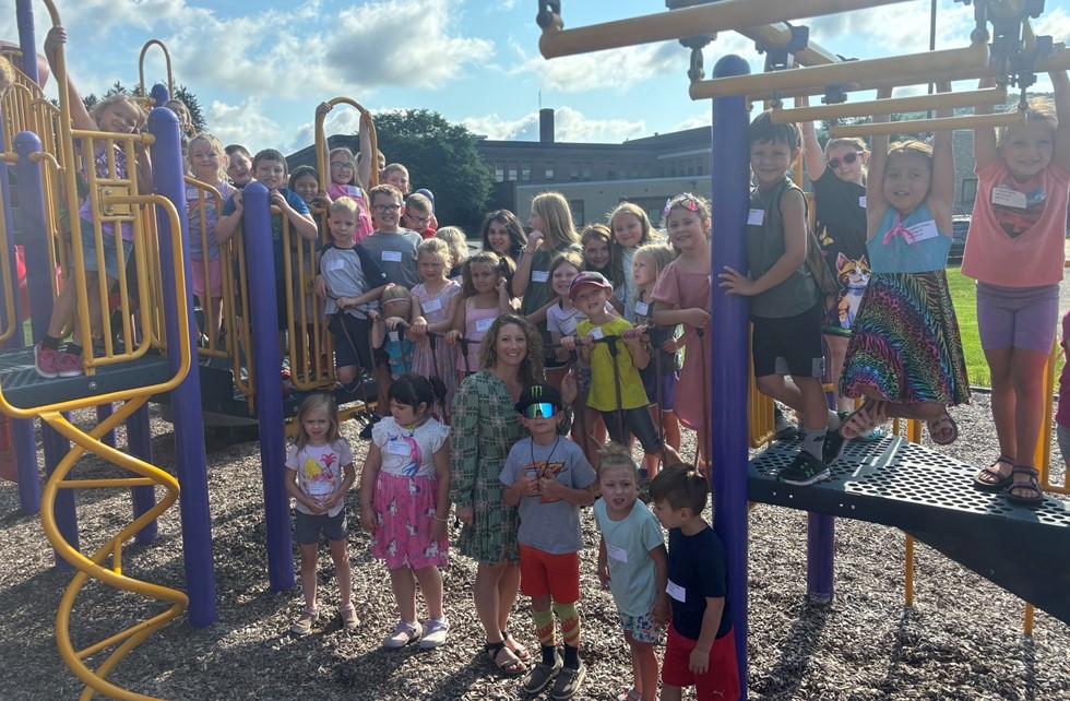 Elementary students and principal
