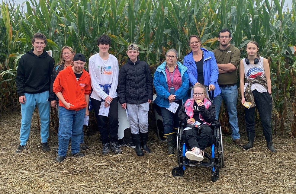 NVHS Students and teachers outside in a cornfield