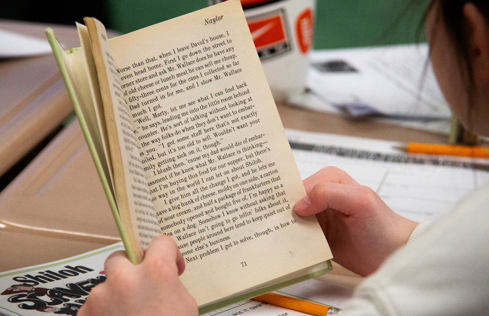 Student reading a book