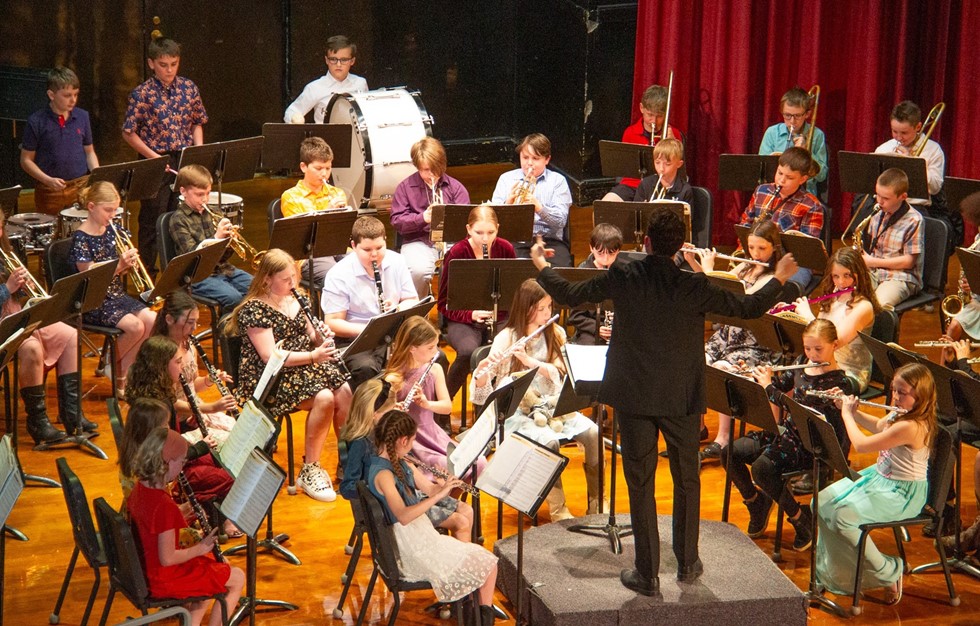 Middle school band performing