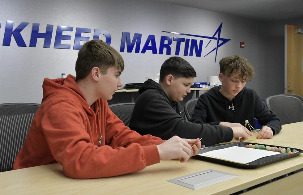 Students working on a project at Lockheed Martin