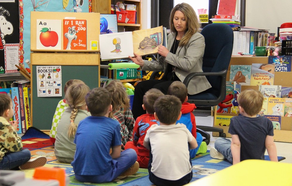 Elementary Prinicipal Mrs. Pratt reads to students