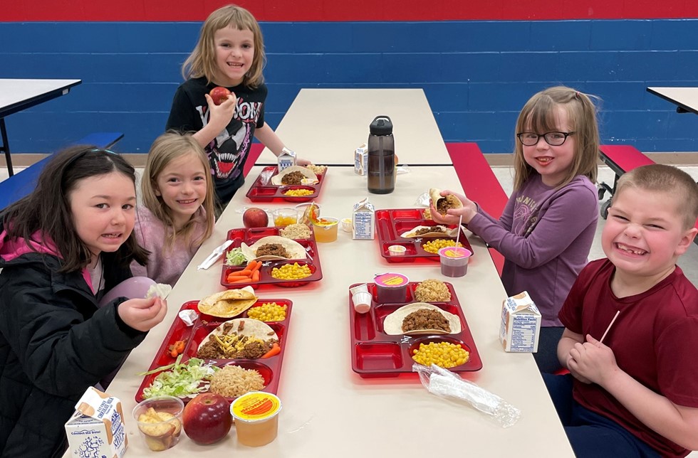 students having lunch at Nathan T Hall Elementary School